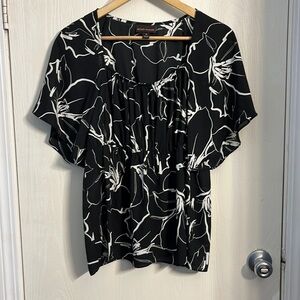 Like new Bold elements black and white top with floral pattern